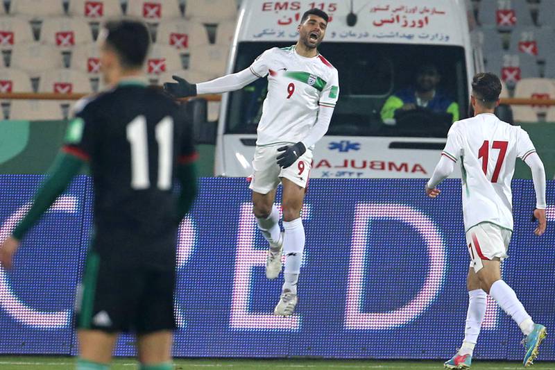 Iran forward Mehdi Taremi celebrates after scoring. AFP