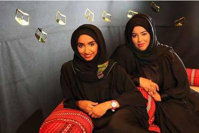 Alia Salem and Maitha Hamdan, who both study media at Dubai Women's College.