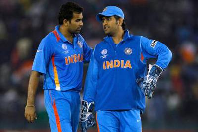 India's Zaheer Khan, left, talks to captain Mahendra Singh Dhoni during the Cricket World Cup semifinal match between Pakistan and India in Mohali, India, Wednesday, March 30, 2011. (AP Photo/Aijaz Rahi) *** Local Caption ***  CWCDA281_India_Cricket_WCup_India_Pakistan.jpg