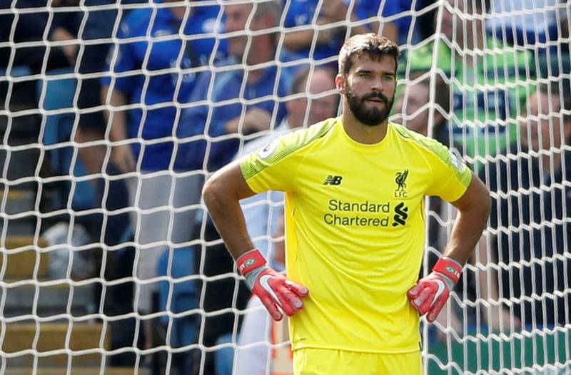 Soccer Football - Premier League - Leicester City v Liverpool - King Power Stadium, Leicester, Britain - September 1, 2018  Liverpool's Alisson looks dejected after Leicester City's first goal   Action Images via Reuters/Carl Recine  EDITORIAL USE ONLY. No use with unauthorized audio, video, data, fixture lists, club/league logos or "live" services. Online in-match use limited to 75 images, no video emulation. No use in betting, games or single club/league/player publications.  Please contact your account representative for further details.