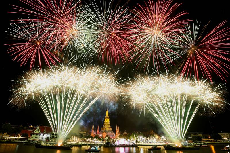 Fireworks explode over the Chao Phraya river during the New Year celebrations, in Bangkok, Thailand. Reuters
