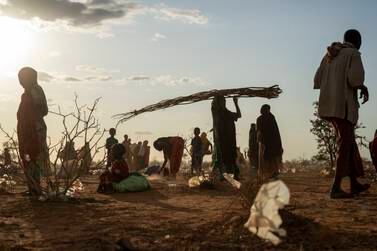 FILE - Somalis who have been displaced due to drought settle at a camp on the outskirts of Dollow, Somalia, Sept.  19, 2022.  An international team of climate scientists says the ongoing drought in Eastern Africa has been made worse by human-induced climate change according to a report from World Weather Attribution.  (AP Photo / Jerome Delay, File)