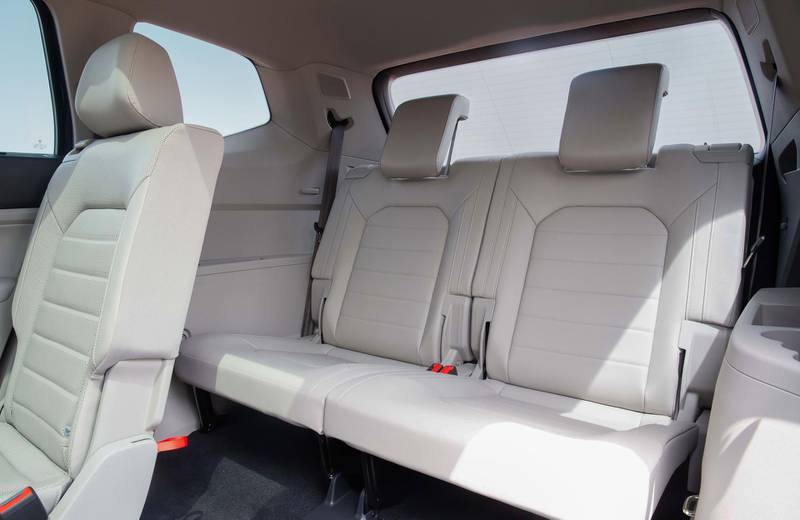 The spacious interior features seven seats in three rows. Volkswagen