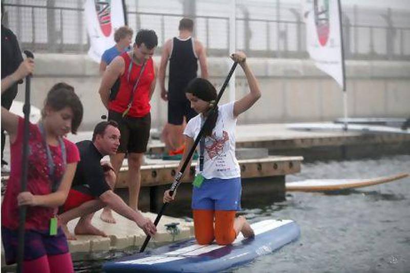 Stand-up paddling is offered free of charge at Yas Marina in Abu Dhabi. Fatima Al Marzooqi / The National