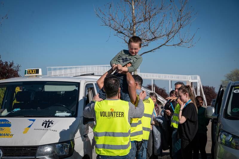 A convoy of Ukrainian refugees who left Mariupol, accompanied by 17 volunteers, arrive at Juan Carlos I park in Madrid. EPA