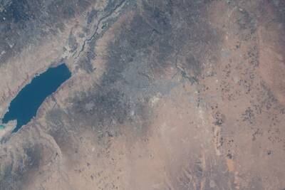 The Dead Sea (left), on the border between the Middle Eastern nations of Israel and Jordan, and Amman (center), the capital of Jordan - captured by Dr Al Neyadi from the ISS on April 13, 2023.
