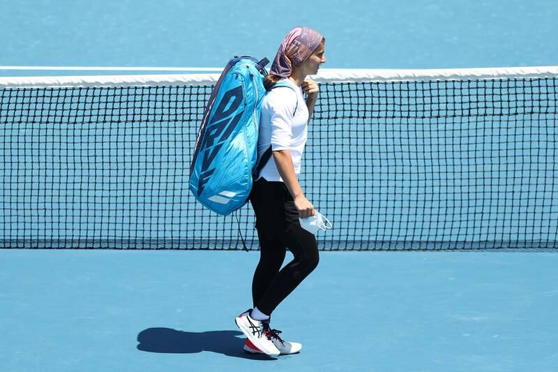 Meshkatolzahra Safi walks onto court ahead of her match against Anja Nayar. Getty Images