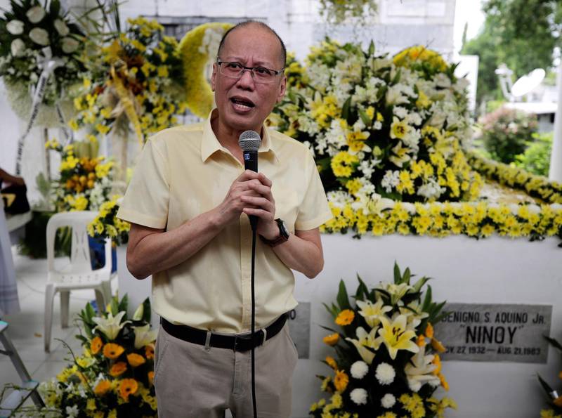 Former Filipino president Benigno Aquino speaks next to the tomb of his mother, former president Corazon Aquino, and father, former senator Benigno 'Ninoy' Aquino, during a mass in Paranaque City  on August 1, 2019. EPA