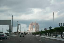 Dark clouds along the Corniche in Abu Dhabi in January. Khushnum Bhandari / The National