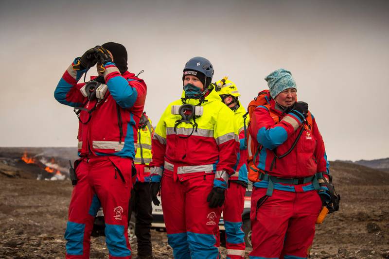 Members of the Search and Rescue Team, Bjorgunasveit look at a new fissure. AP Photo