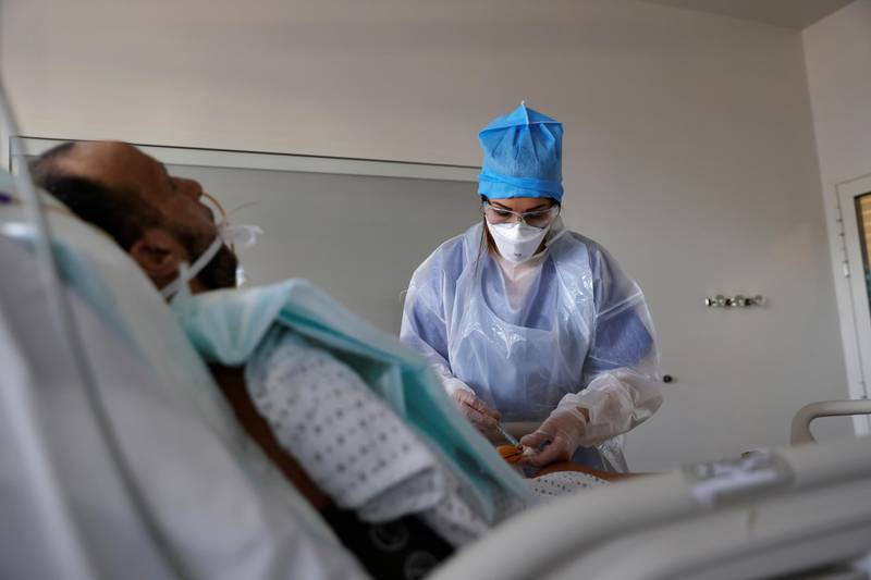 A medical staff member works in the Intensive Care Unit where patients suffering from Covid-19 are treated at the hospital in Valenciennes, France. Reuters