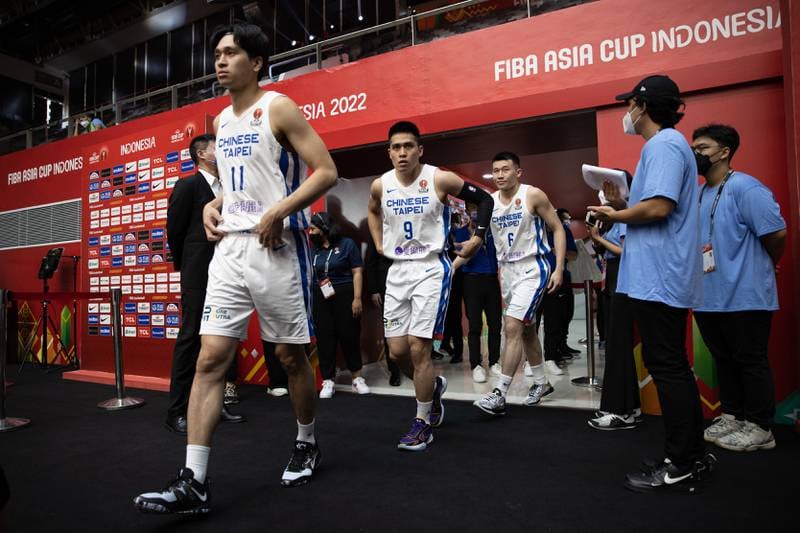 Chinese Taipei players enter the court.