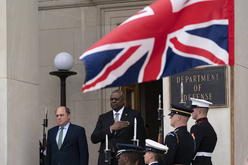 US Defence Secretary Lloyd Austin, right, with Mr Wallace during an honour cordon ceremony at the Pentagon in May. AP