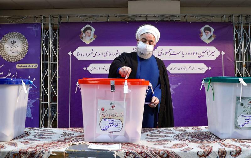 President Hassan Rouhani casts his ballot during the Iranian presidential election, at the interior ministry in the capital Tehran. AFP