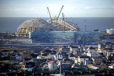 The "Iceberg" Skating Palace and "Fisht" stadium construction site at the Olympic Park in the Russian Black Sea resort of Sochi. Mikhail Mordasov / AFP