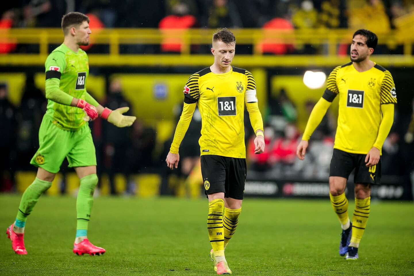 Dortmund's Marco Reus and teammates react after losing. EPA