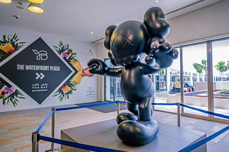 'Final Days' by American artist Kaws is one of two new sculptures at Yas Bay Waterfront. Photo: Yas Bay Waterfront