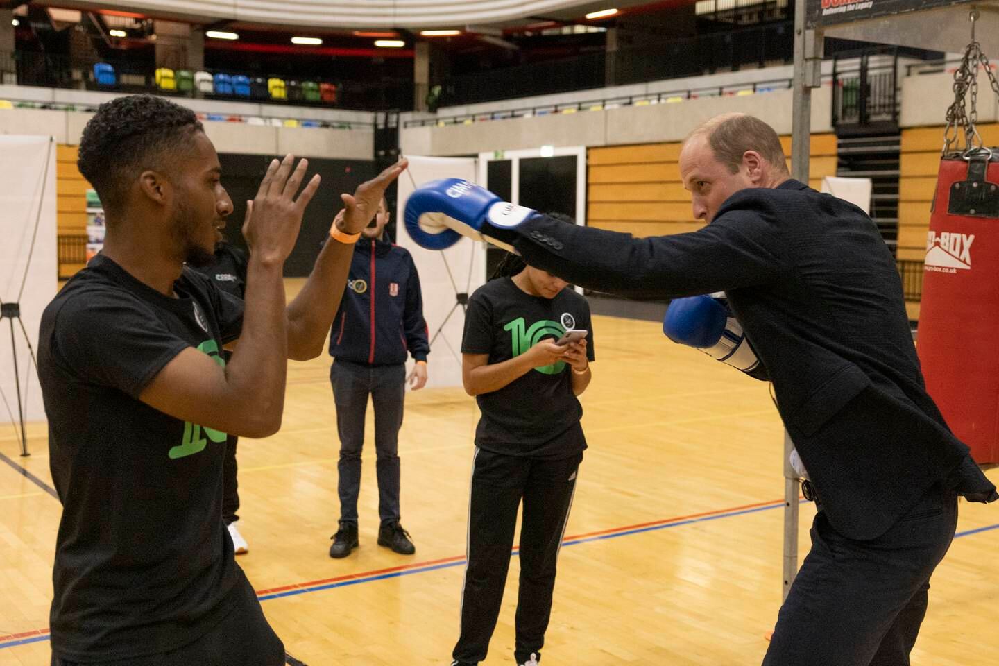 Prince William, Prince of Wales spars with amateur boxer and Coach Core coach Joshua Jones. Getty