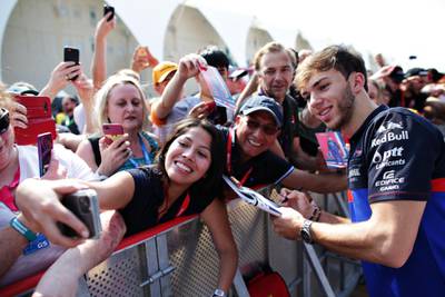 Pierre Gasly of France and Scuderia Toro Rosso greets fans before final practice for the F1 Grand Prix of Abu Dhabi at Yas Marina Circuit. Getty