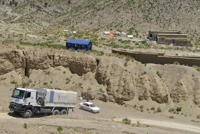 World Food Programme trucks with aid material head out towards affected villages. AFP