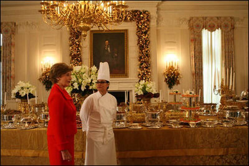 Ms Comerford and Laura Bush, the first lady at the time, discuss holiday food in the State Dining Room. Photo: National Archives