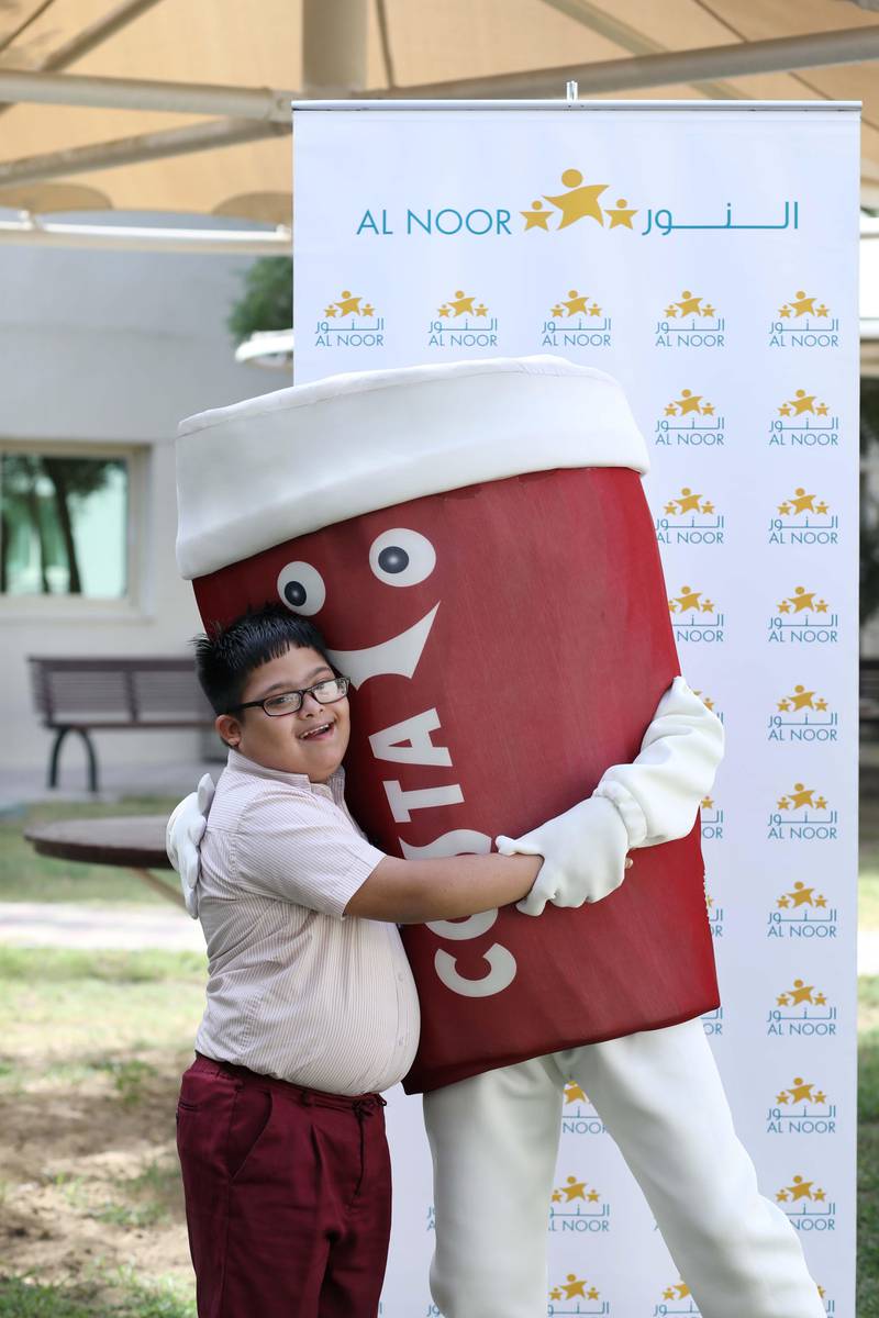 Costa Coffee is aiming to inspire people across the Emirates to help raise AED100,000 for the Al Noor Training Centre with its Hug a Mug initiative. Courtesy Costa