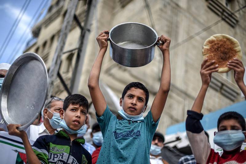 Palestinian refugees attend a protest on the 103rd anniversary of Balfour Declaration in Khan Younis refugee camp, in the southern Gaza Strip. EPA