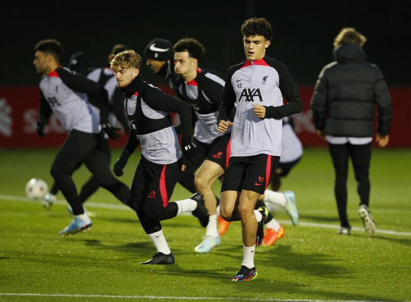 Liverpool's Stefan Bajcetic and Harvey Elliott with teammates during training. Reuters 