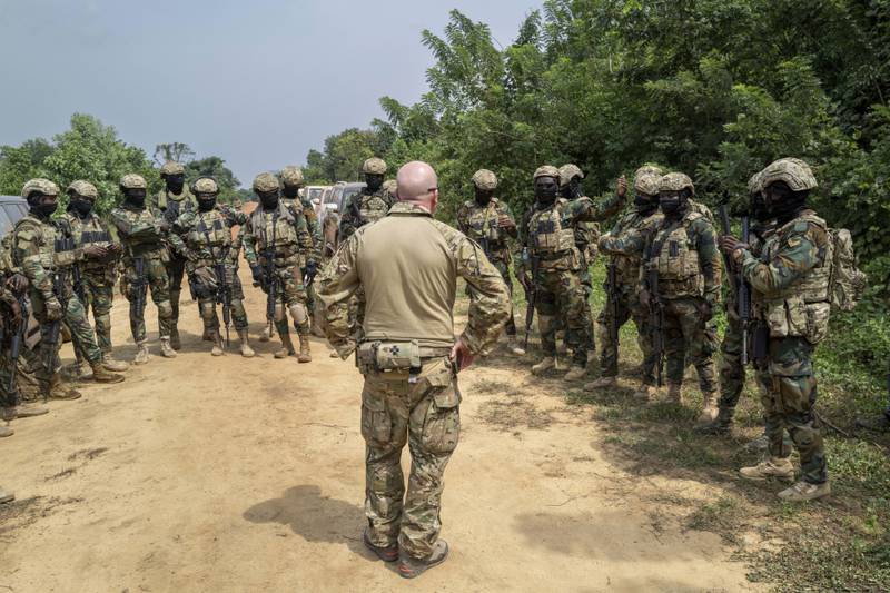 A British soldier briefs Ghanaian special force soldiers taking part in counter-terrorism training in the Ivory Coast. AP