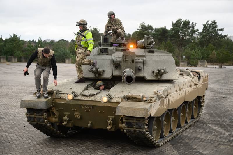  Ukrainian recruits training on a Challenger 2 tank in England. Getty