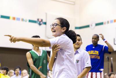 Pupils play basketball with the Harlem Globetrotters.  Reem Mohammed / The National