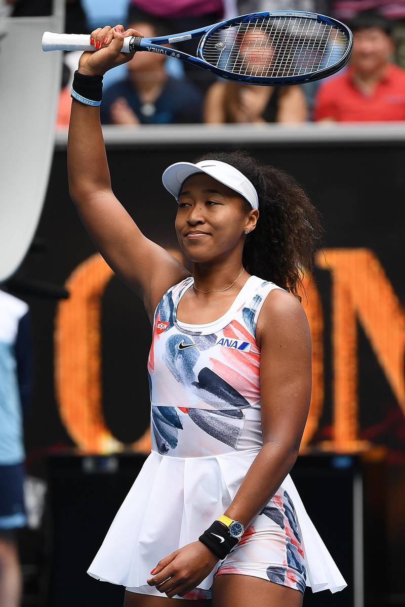 MELBOURNE, AUSTRALIA - JANUARY 22: Naomi Osaka of Japan shows appreciation to the crowd after winning her Women's Singles second round match against Saisai Zheng of China on day three of the 2020 Australian Open at Melbourne Park on January 22, 2020 in Melbourne, Australia. (Photo by Quinn Rooney/Getty Images)