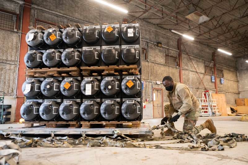 Airman 1st Class Olabode Igandan organises ammunition, weapons and other equipment bound for Ukraine during a foreign military sales mission at Dover Air Force Base, Delaware. AP