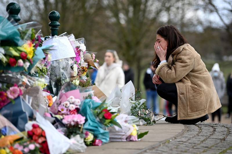 A woman pays tribute to Sarah Everard at Clapham Common bandstand, London. Getty Images