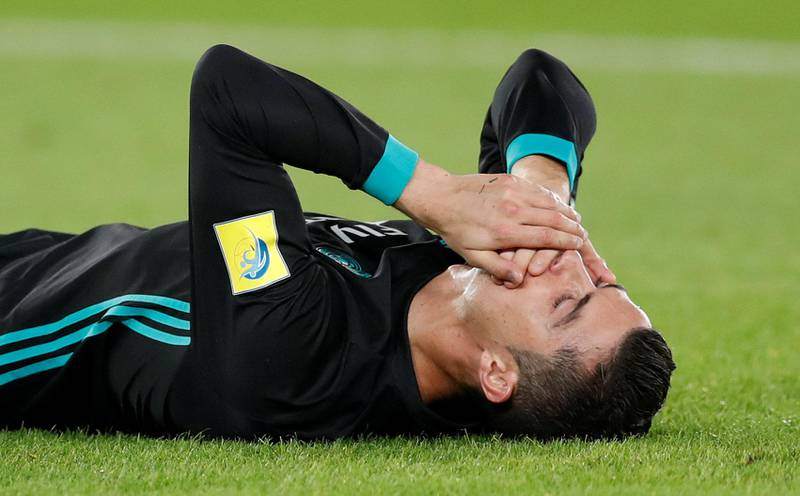 Real Madrid’s Cristiano Ronaldo goes down after sustaining an injury to his face. Matthew Childs / Reuters