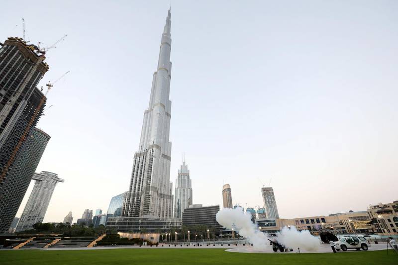 Dubai, United Arab Emirates - Reporter: N/A: The cannon firing to mark the breaking of the fast at Maghrib sunset prayers. Friday, April 24th, 2020. Burj Khalifa, Dubai. Chris Whiteoak / The National