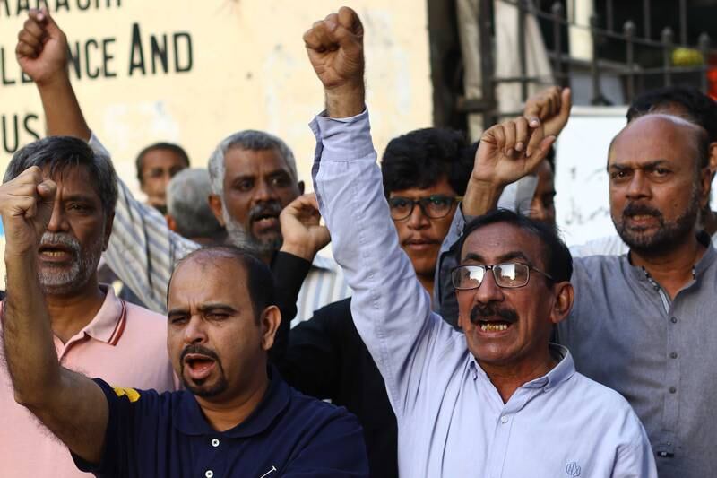 Journalists hold a protest in Karachi, Pakistan, following the death of Sharif in Kenya. Sharif, who was a staunch critic of the all-powerful military establishment, fled the native country to avoid arrest over sedition charges. EPA