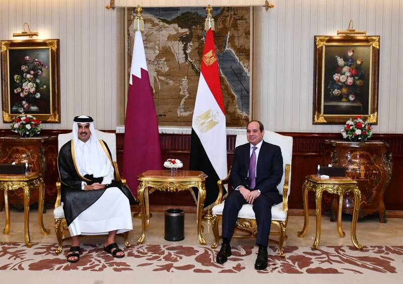 Sheikh Tamim, left, and Mr El Sisi. EPA