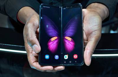 LAS VEGAS, NEVADA - JANUARY 08: The Galaxy Fold 5G is displayed at the Samsung booth during CES 2020 at the Las Vegas Convention Center on January 8, 2020 in Las Vegas, Nevada. CES, the world's largest annual consumer technology trade show, runs through January 10 and features about 4,500 exhibitors showing off their latest products and services to more than 170,000 attendees.   David Becker/Getty Images/AFP