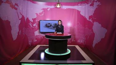 An image that illustrates this article Taliban order Afghan women TV presenters to cover their faces on air