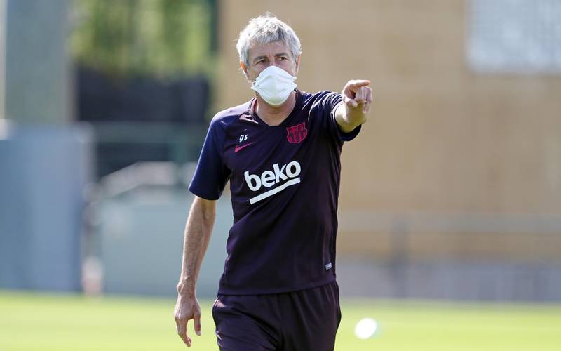 Barcelona head coach, Quique Setien (C), leads a training session at Joan Gamper Sports City in Barcelona. EPA
