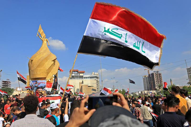 Iraqis take part in ongoing anti-government protests in Karabala. AFP