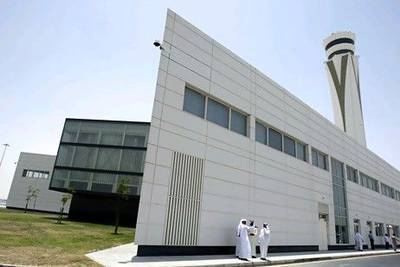 Emirati officials tour the control tower building at World Central-Al Maktoum International Airport in Dubai. AP Photo