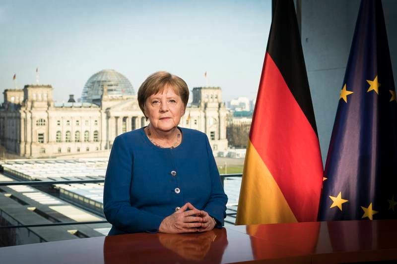 Mrs Merkel addressing the nation via a video statement about the continuing Covid-19 pandemic, on March 18, 2020. It was the first time in her 15-year tenure as chancellor that Mrs Merkel addressed citizens directly via a televised statement other than her New Year's Eve message. Getty Images