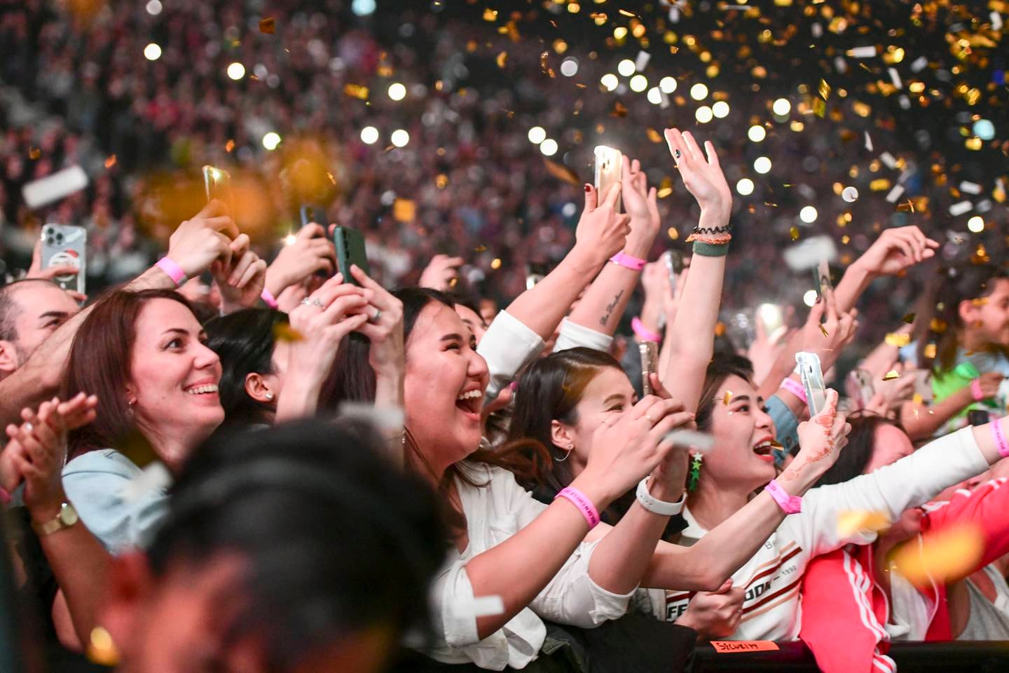 Fans cheer for Imagine Dragons at Etihad Arena, Abu Dhabi. Khushnum Bhandari / The National