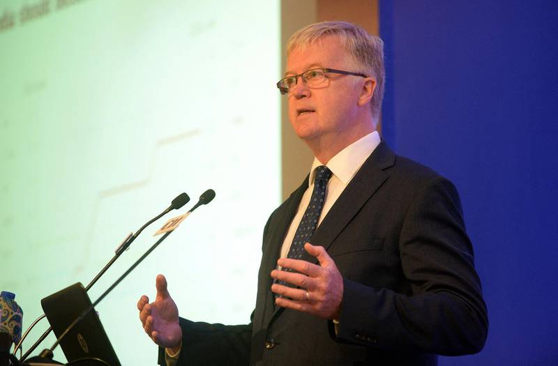 Chief Economist for the International Air Transport Association (IATA) Brian Pearce delivers a speech during a conference on Aviation Day in New Delhi on July 14, 2015. The Confedration of Indian Industry (CII) is holding a panel discussion on India's emerging aviation market. AFP PHOTO/PRAKASH SINGH (Photo by PRAKASH SINGH / AFP)