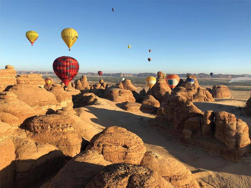 Balloons flying over the Unesco World Heritage Site of Al Ula