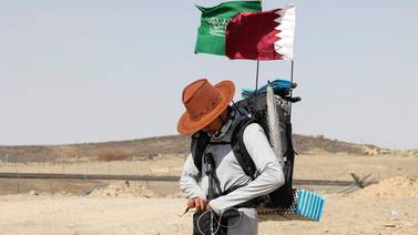 An image that illustrates this article Saudi fan treks the desert to get to World Cup