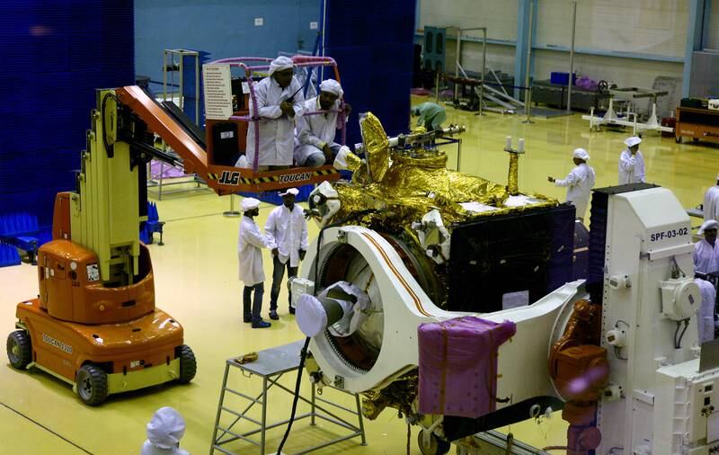 Isro scientists work on the orbiter vehicle of Chandrayaan-2. EPA-EFE