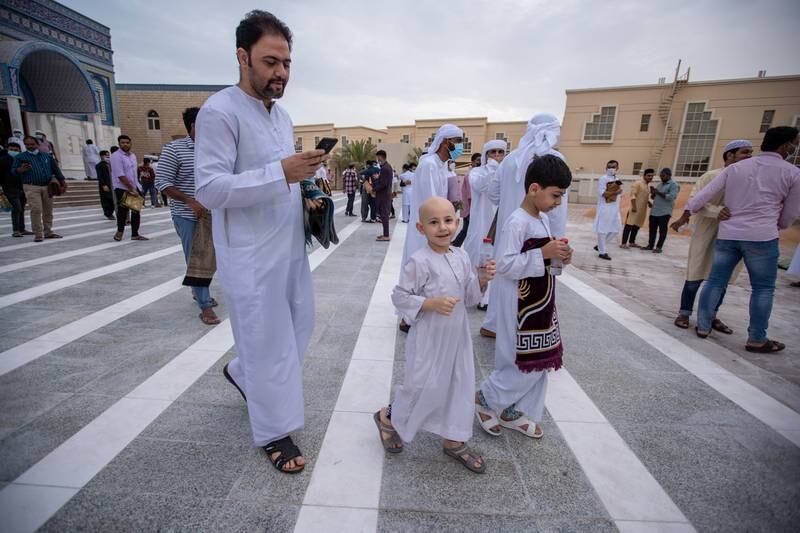 Worshippers after morning prayers in Abu Dhabi. Victor Besa / The National